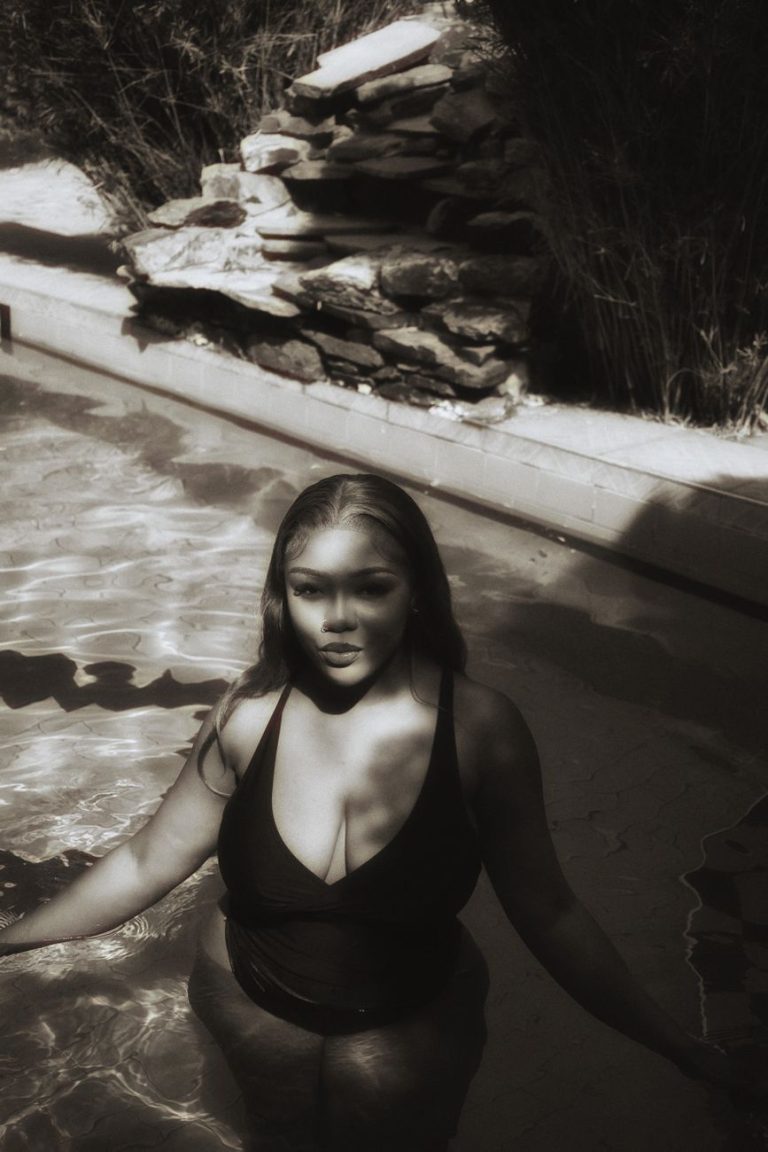 Woman in a bikini by the water