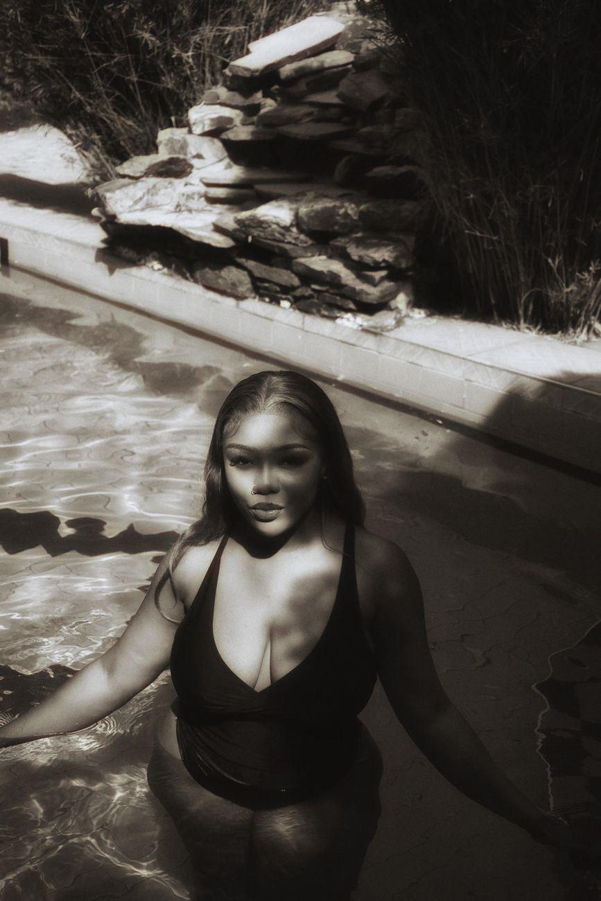 Woman in a bikini by the water