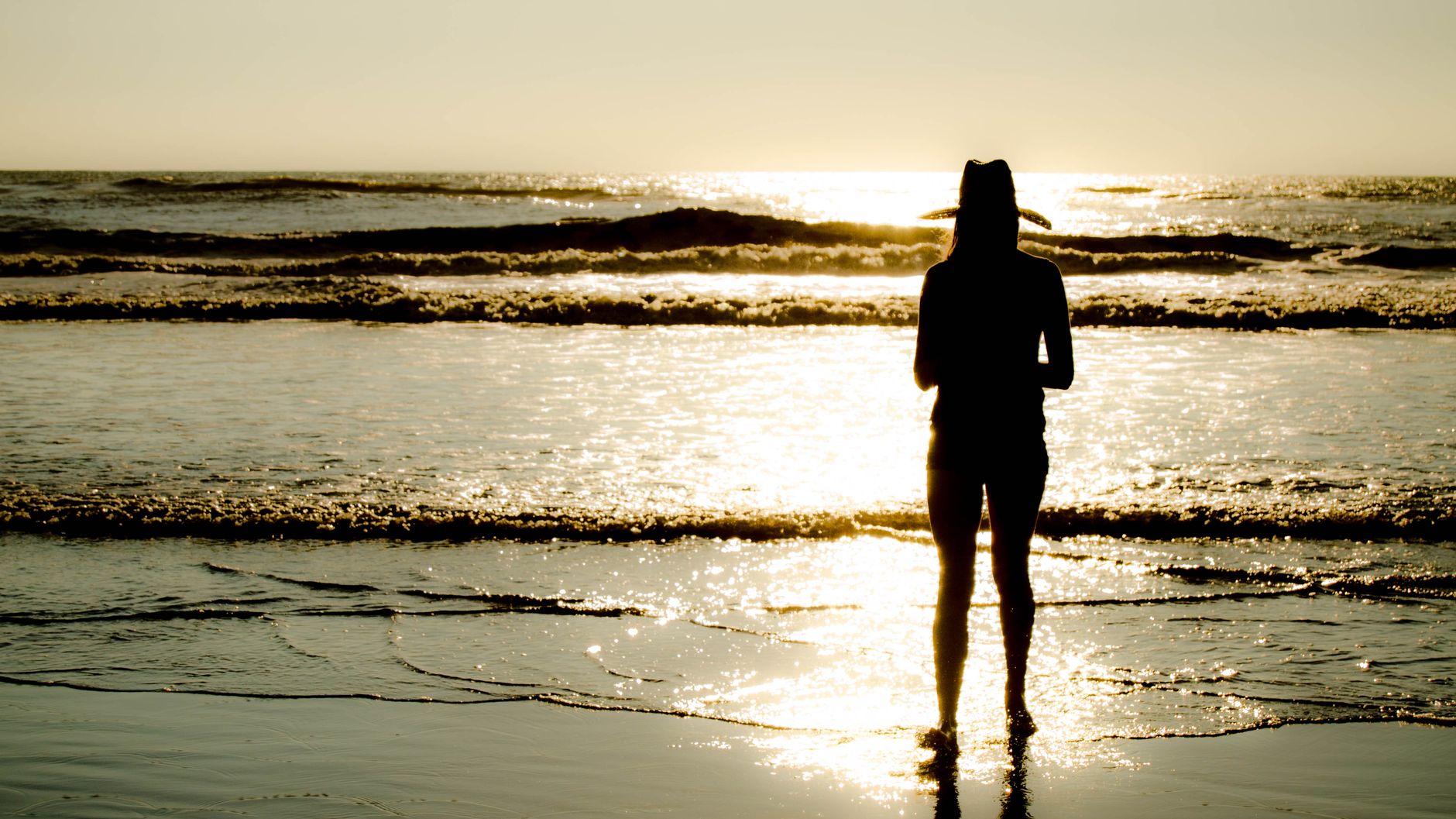 Woman in a bikini by the water